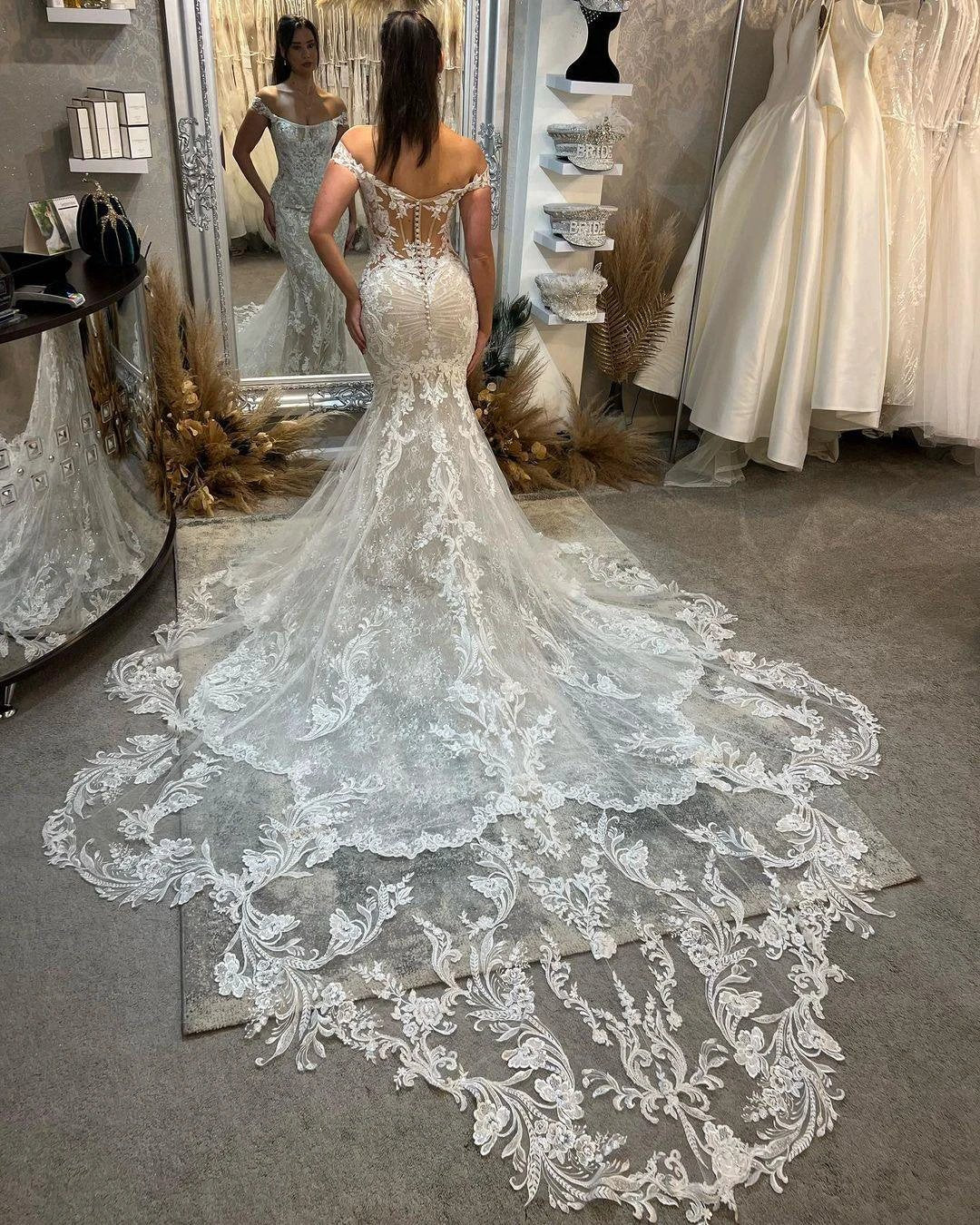 Trendy Floor Length Off-The-Shoulder Sleeveless Mermaid Lace Wedding Dress with Cathedral Train by misshow.com