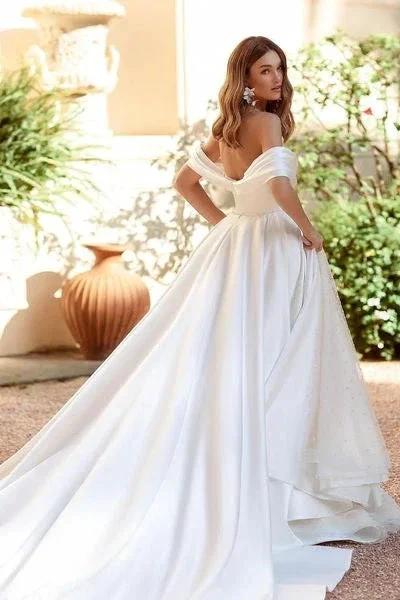 White A-line Sequined Off-the-shoulder Wedding Dress With Ruffles by misshow.com