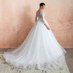 Wonderful Long A-line Appliques Tulle Wedding Dress with Sleeves by BIZTUNNEL